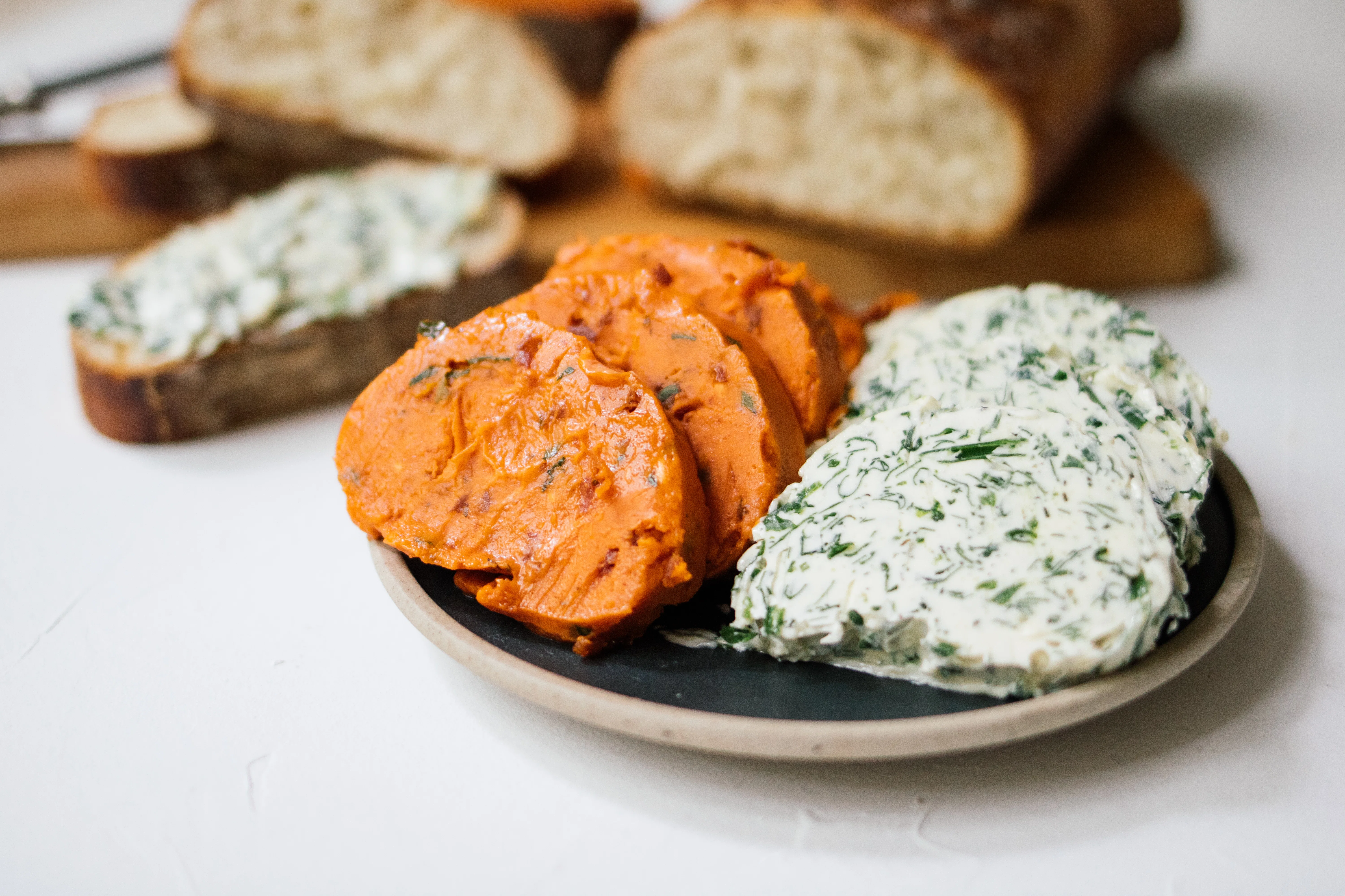 Vegan herb butter and tomato butter
