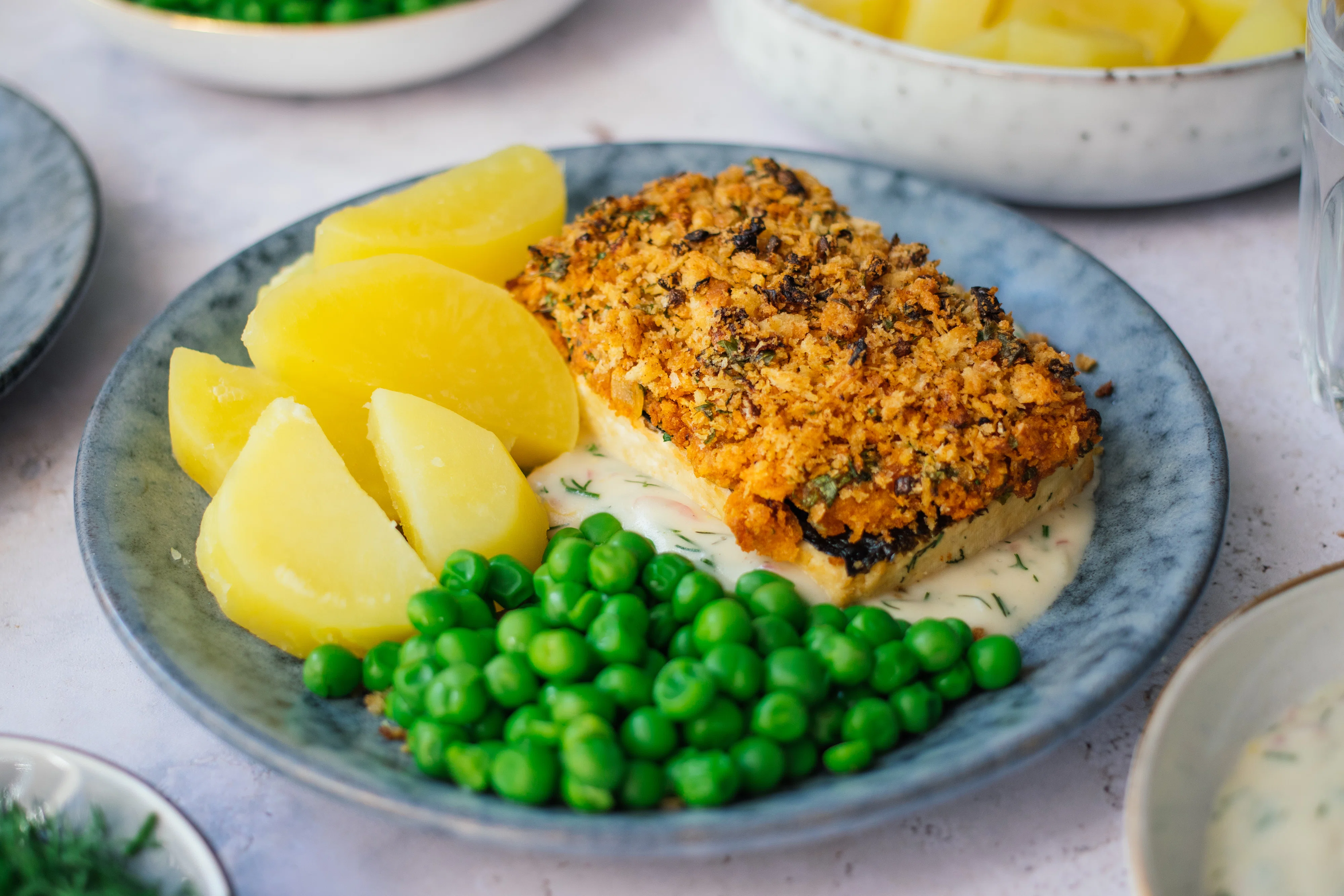 Herb Crusted Tofu with Lemon Mustard Sauce, Boiled Potatoes, and Peas
