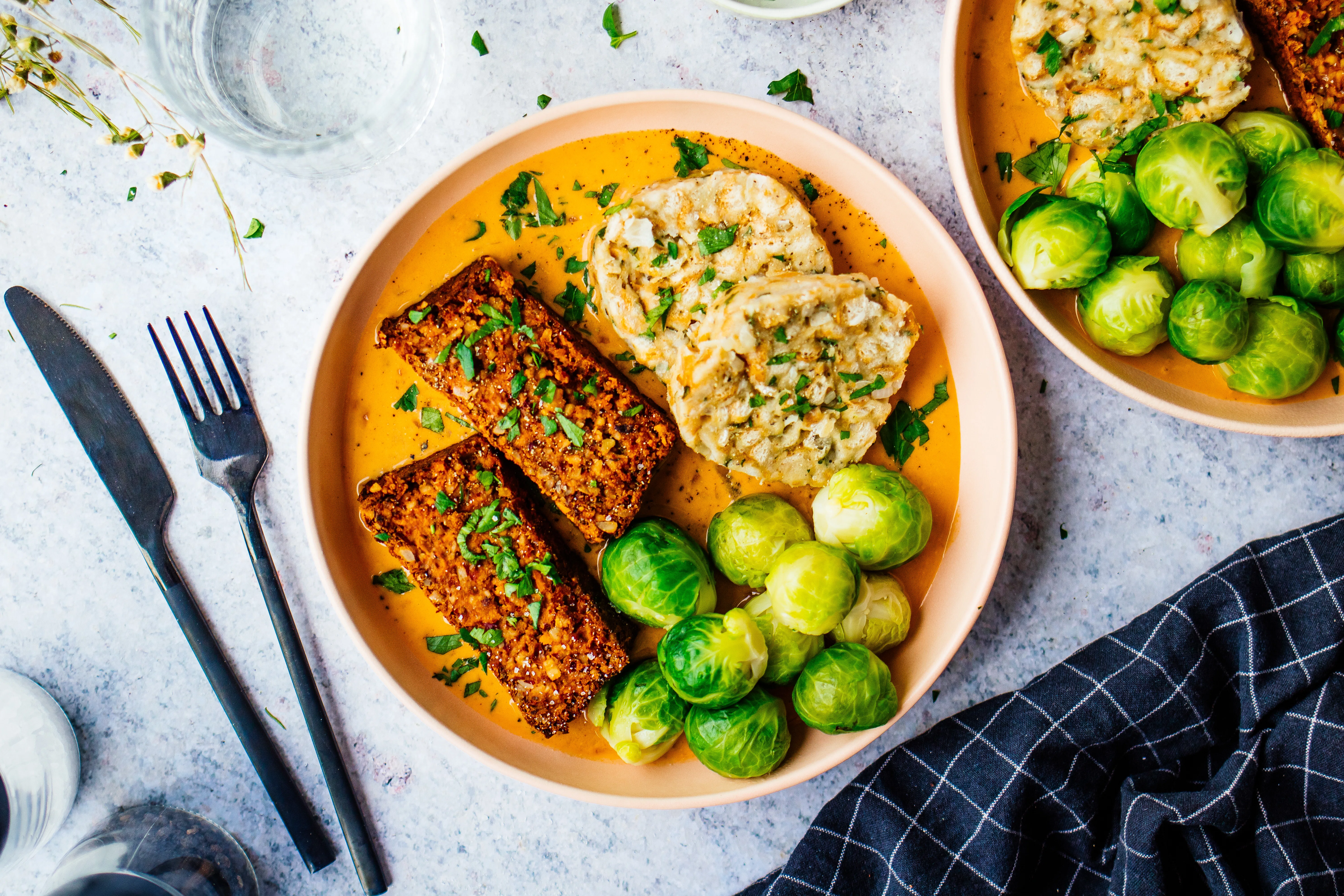 Vegan Nut Roast with Bread Dumplings and Creamy Onion Sauce